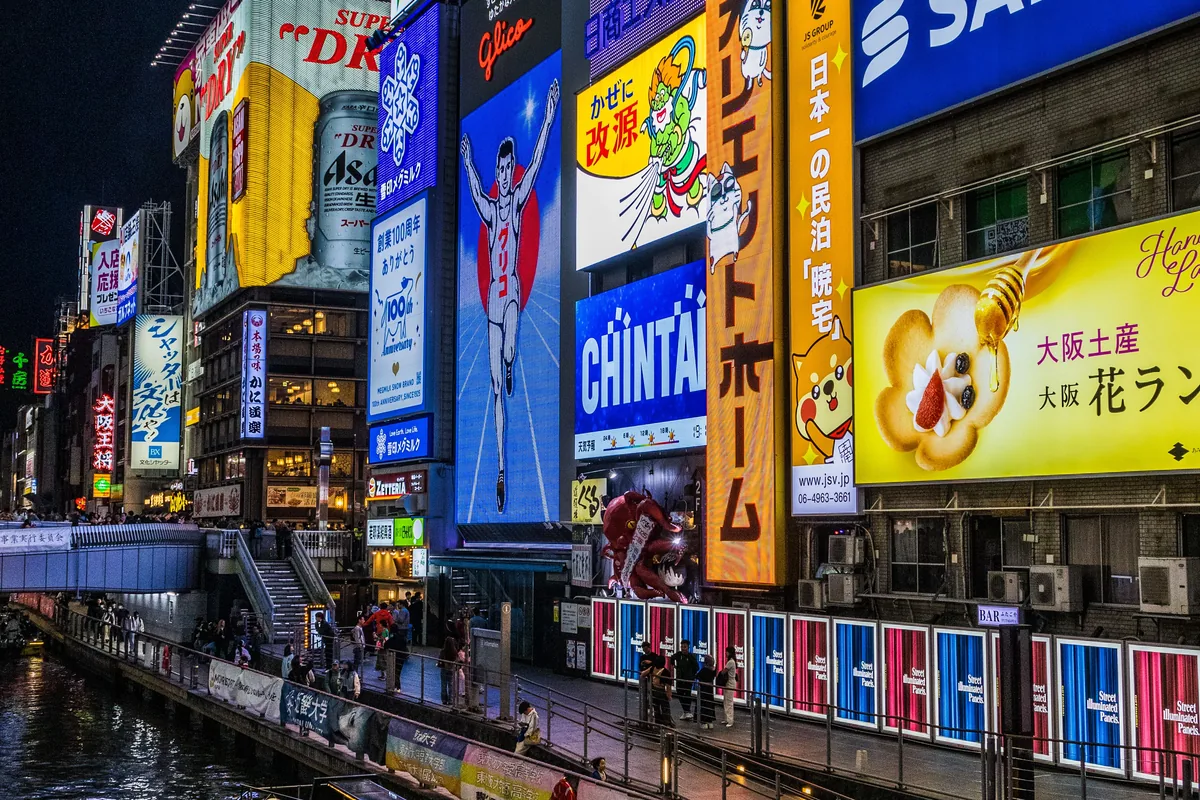 The illuminated signs and canal of Dotonbori in Osaka at night